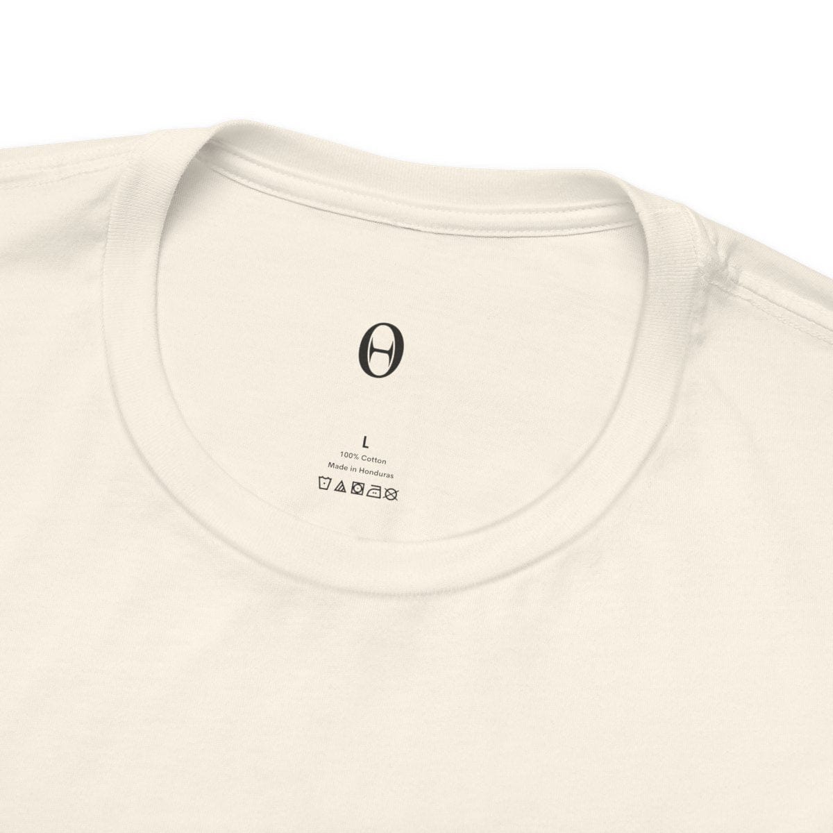 Dark ZeroHedge inner-collar logo and care text on Natural